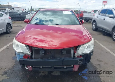 2012 Toyota Camry Le z USA, uszkodzony, nr VIN 4T4BF1FK5CR271303